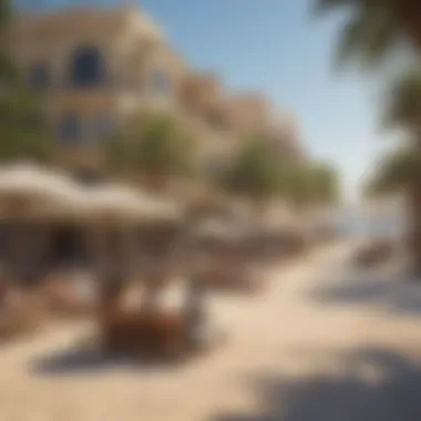 Visitors enjoying recreational activities at Al Hudayriyat Beach under a clear blue sky