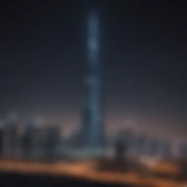 Night view of Al Noor Tower illuminated against the Dubai skyline