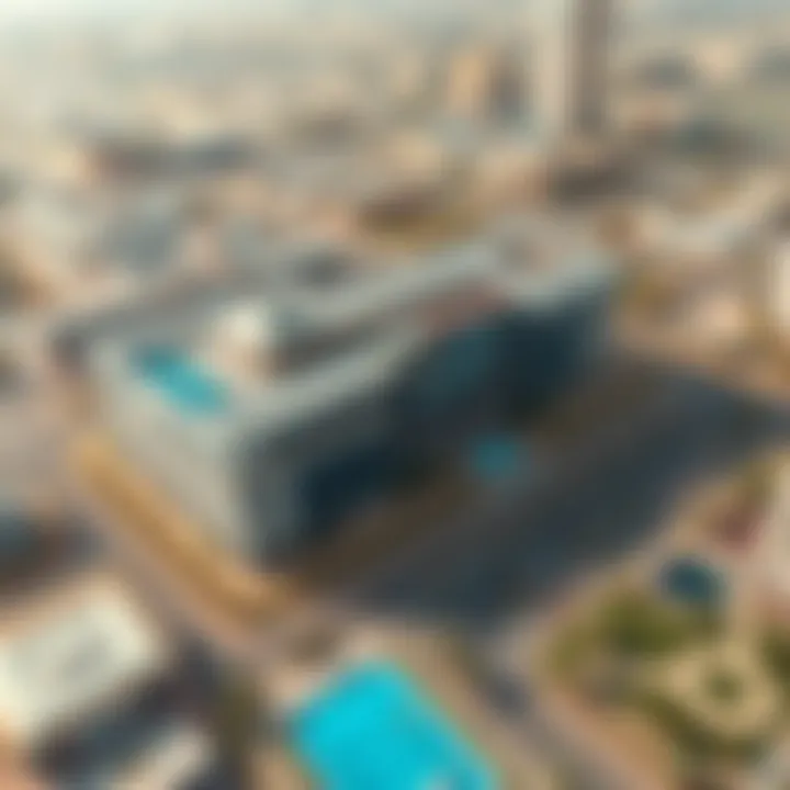 Aerial Perspective of Al Karama Business Center Aerial view of Al Karama Business Center showcasing its architectural design and surroundings
