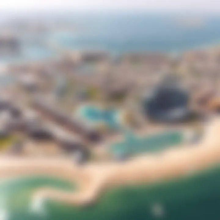 Aerial view of Almamzar Beach with surrounding real estate developments